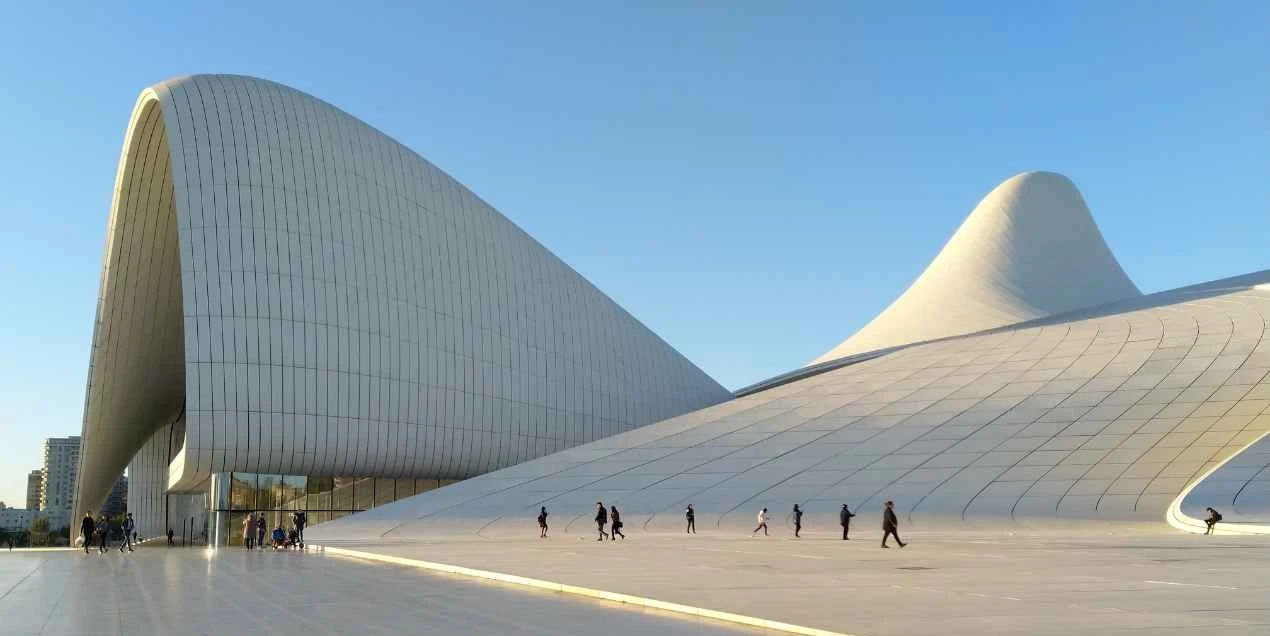 3-night-4-days-azerbaijan-tour-package-JustWravel-1736834551-Heydar-Aliyev-Center-in-Baku-under-Clear-Sky.jpg