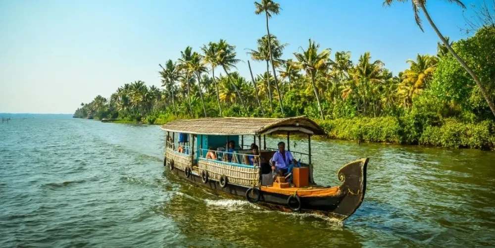 kerala-backwater-tour-package-with-munnar-thekkady-and-Alleppey-JustWravel-1750662390-Vembanad-lake.webp
