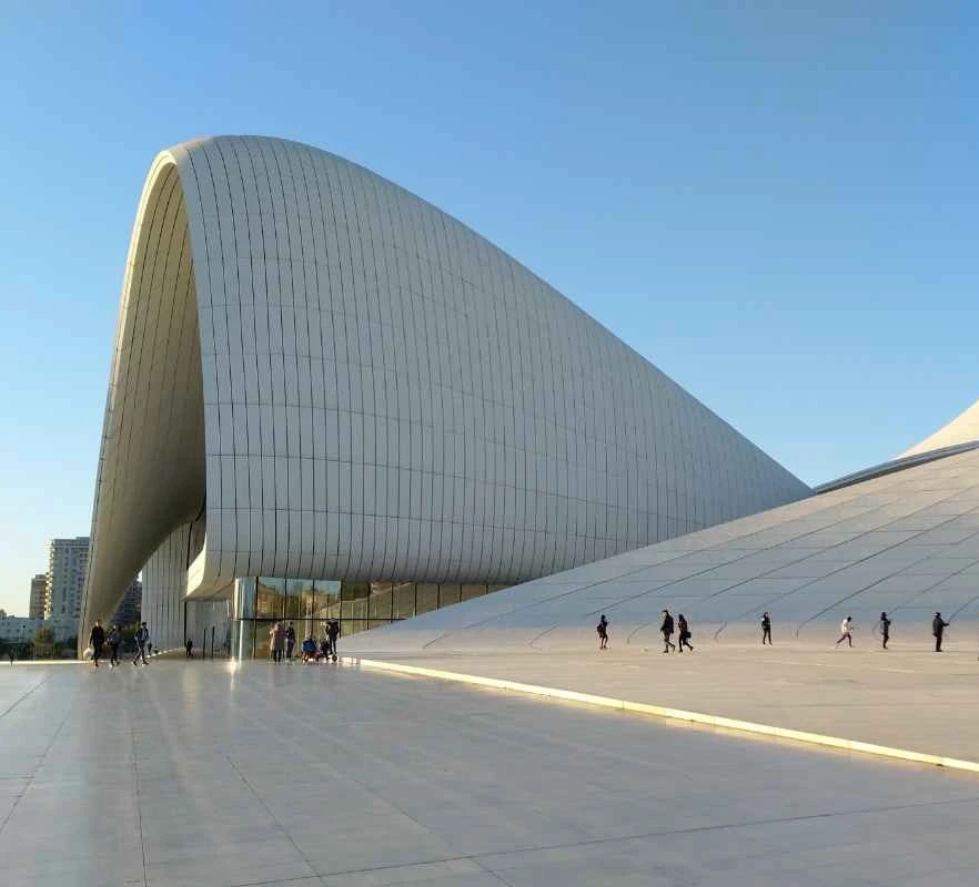 3-night-4-days-azerbaijan-tour-package-JustWravel-1736834697-Heydar-Aliyev-Center-in-Baku-under-Clear-Sky.jpg