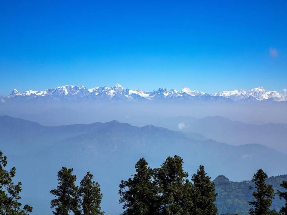 Snow capped mountains views from Dhanaulti