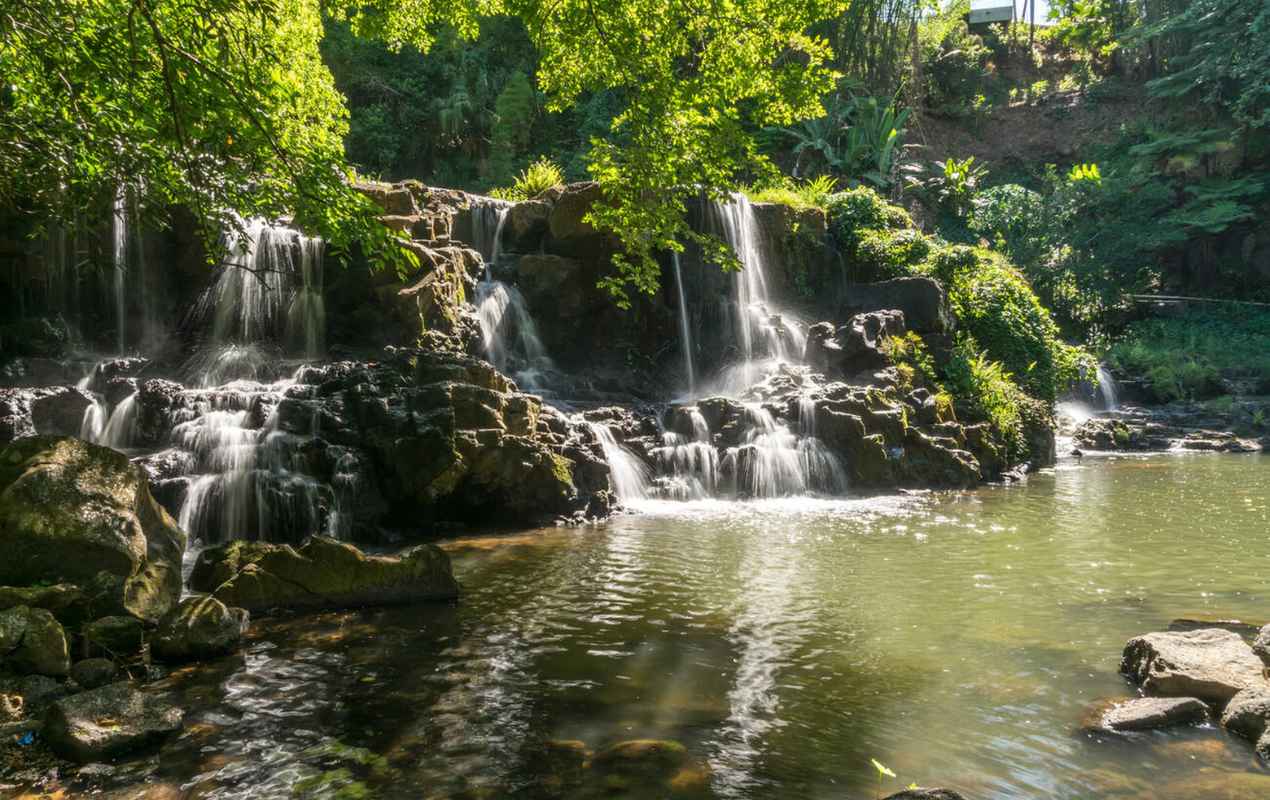 Waterfall in the park of Eureka House, Maison Eureka