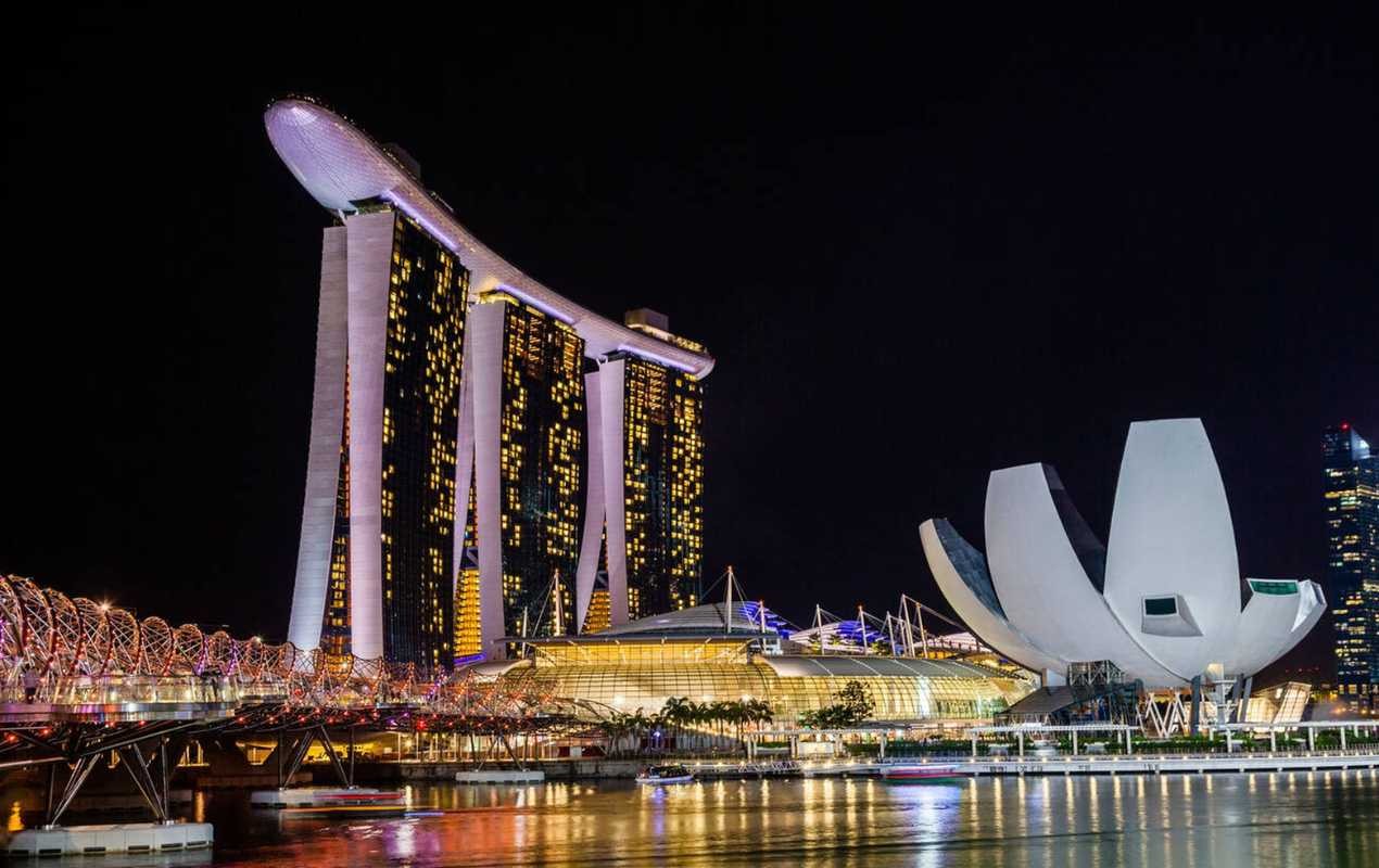 Night view of Marina Bay Sands, Art Science Museum and the Helix Bridge.