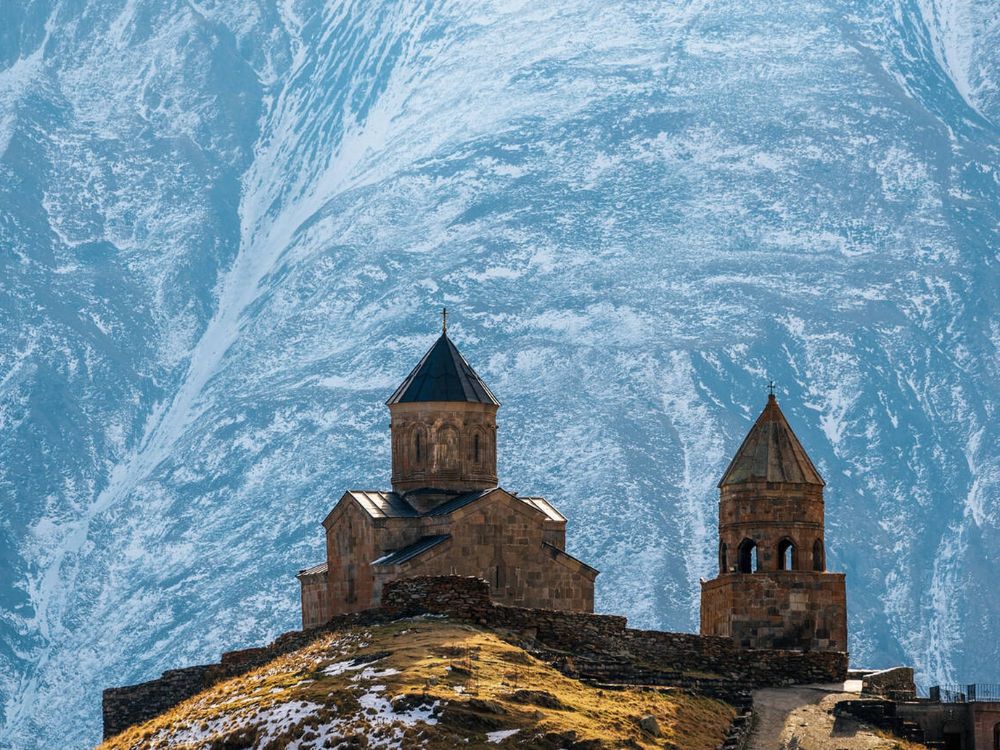 5-nights-6-days-georgia-tour-JustWravel-1743146711-Gergeti-Trinity-Church-Georgia.jpg