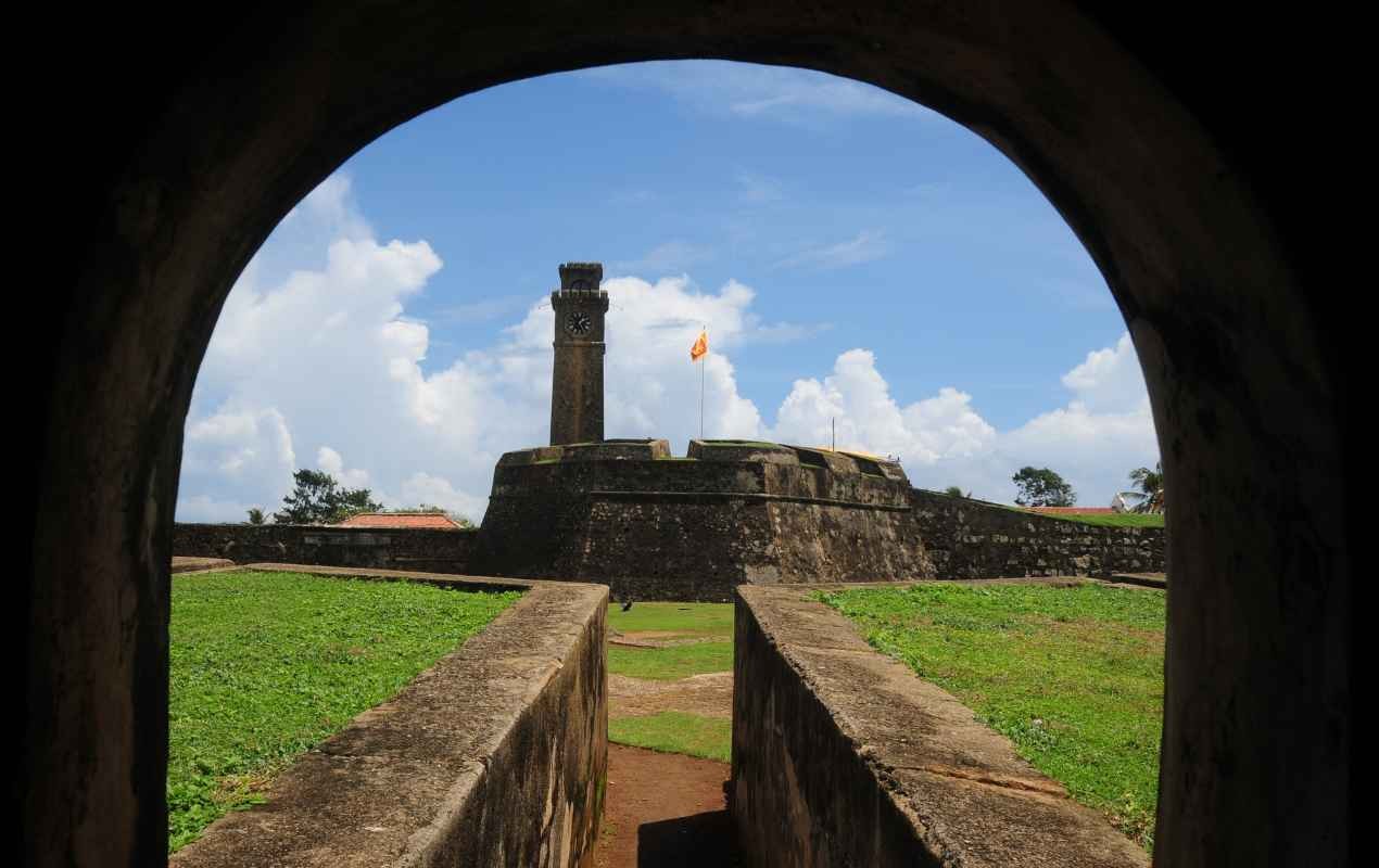 A wide angle shot of the Moon Bastion and the 19th century clock tower at the Galle Fort.