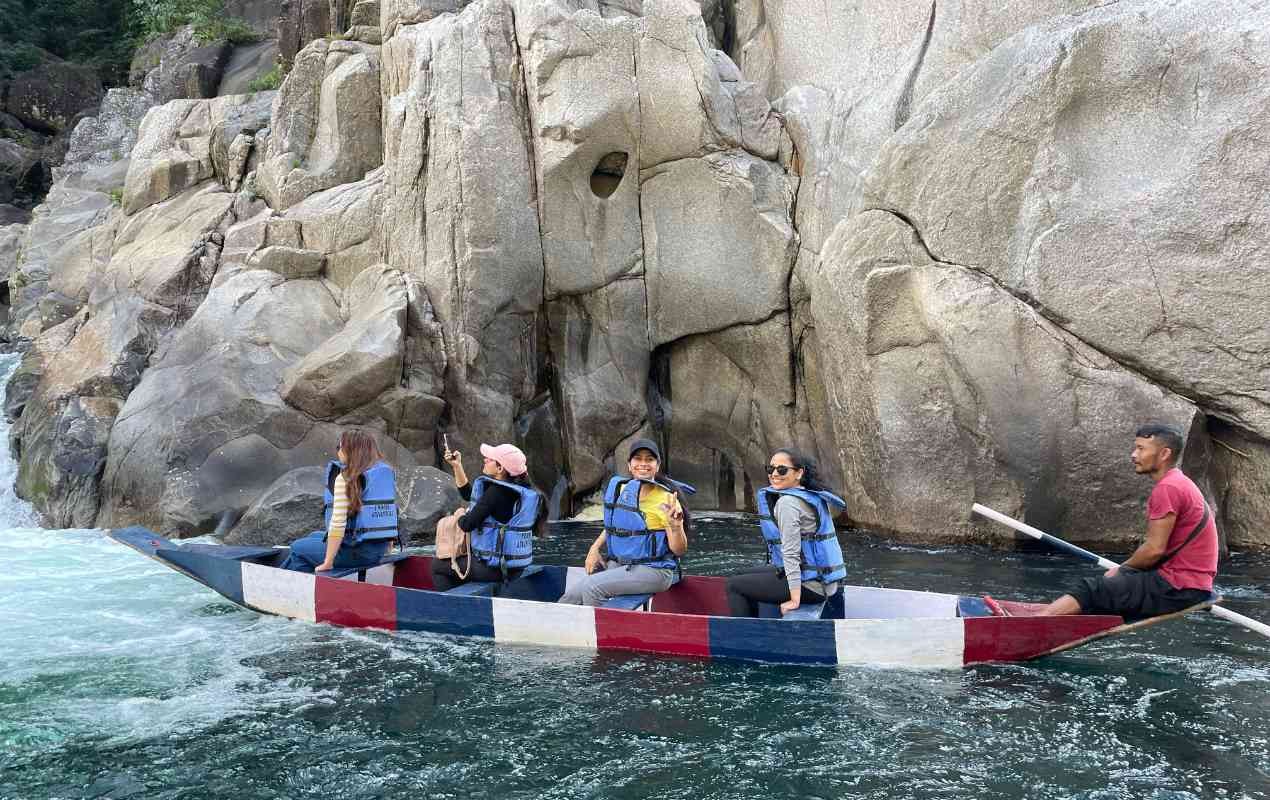 Girls boating in Dawki River