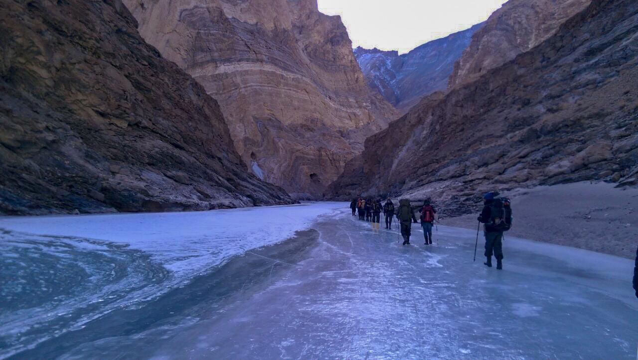 Trekkers on Chadar Trek during snowfall