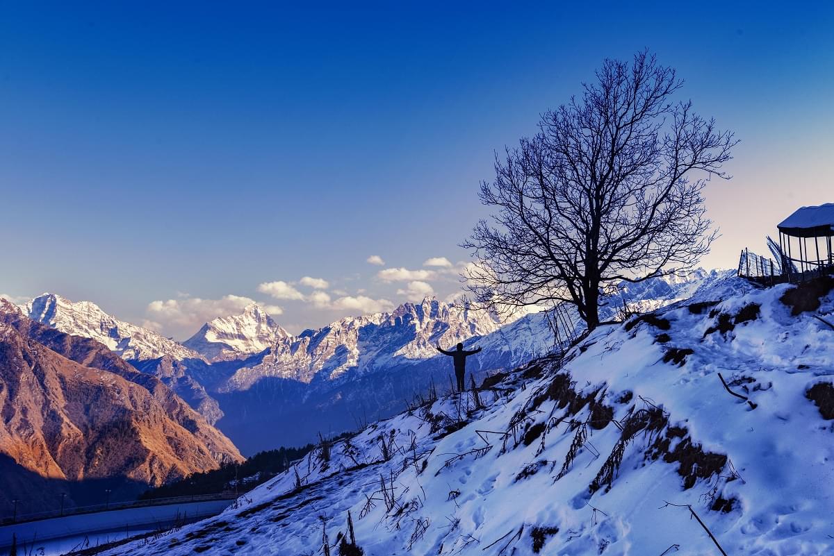 Snow covered peaks visible after the trek