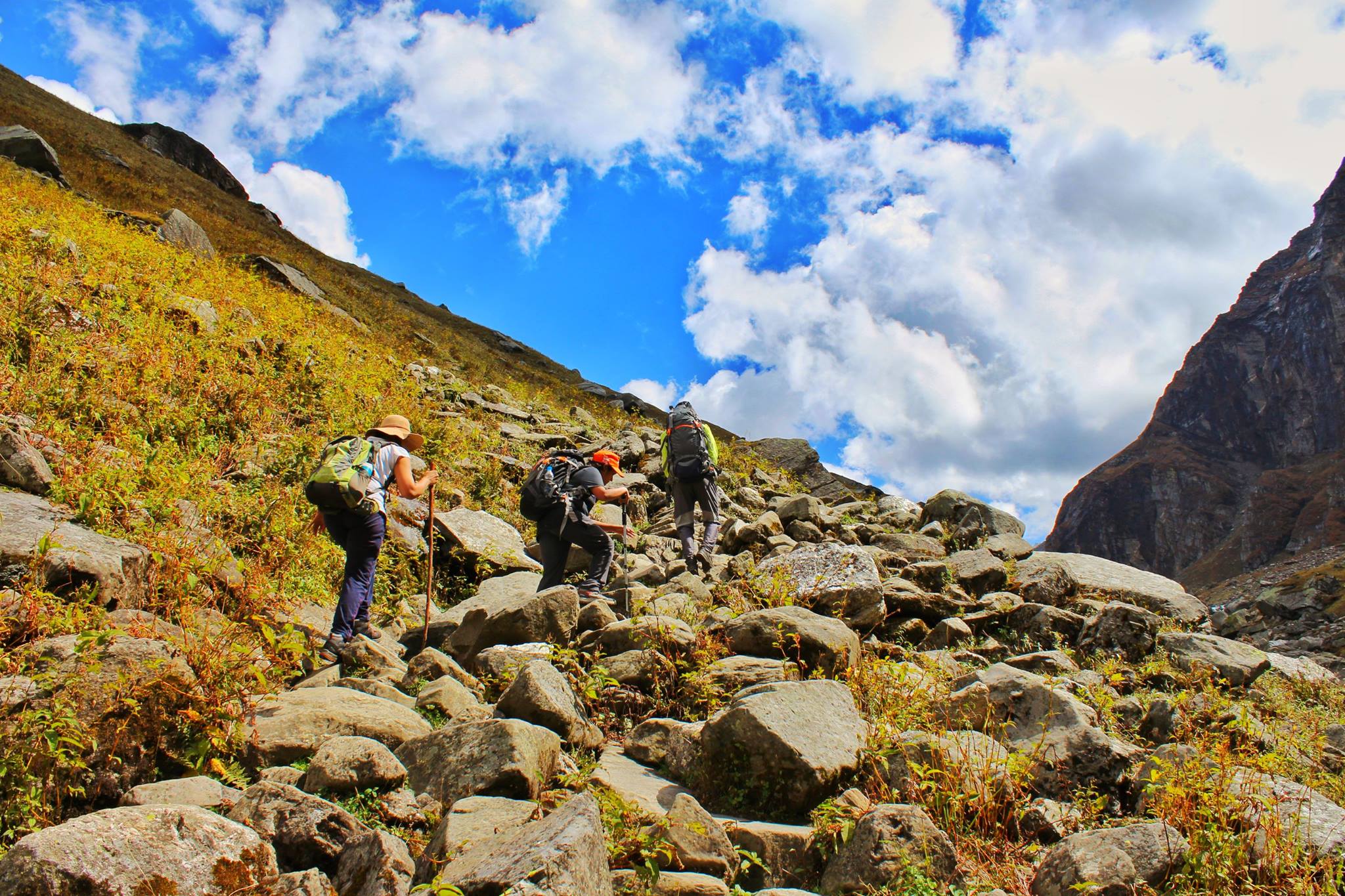 Trekkers Embarking On Rugged Terrain