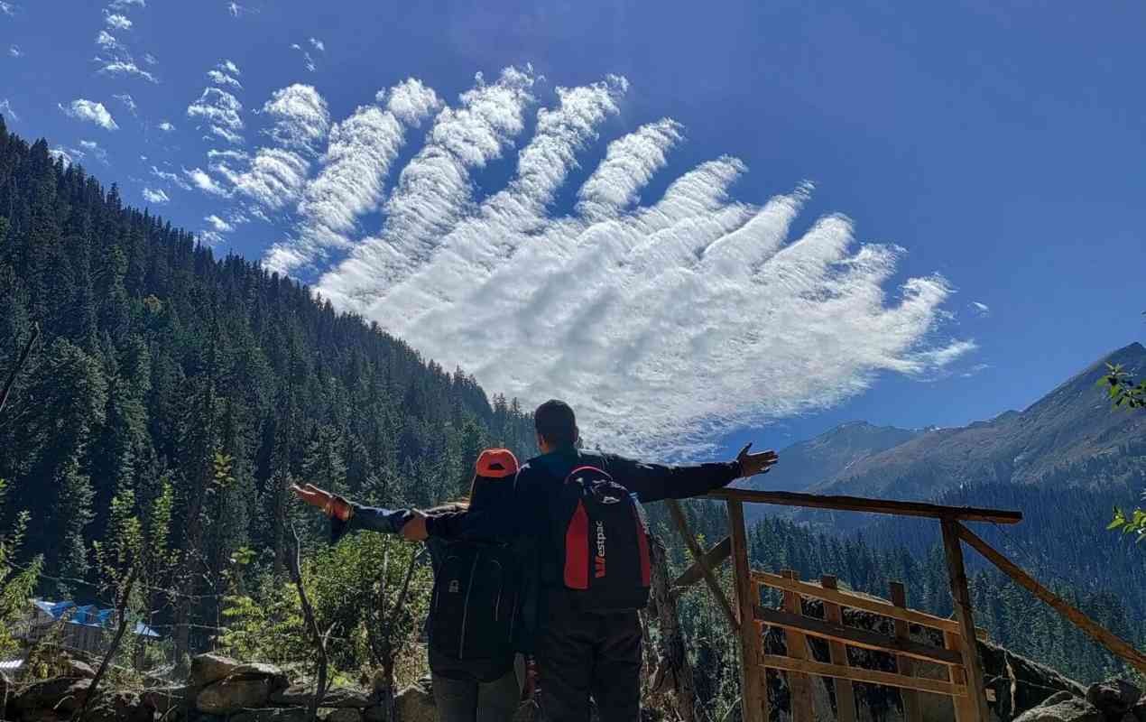 A couple posing with stunning views