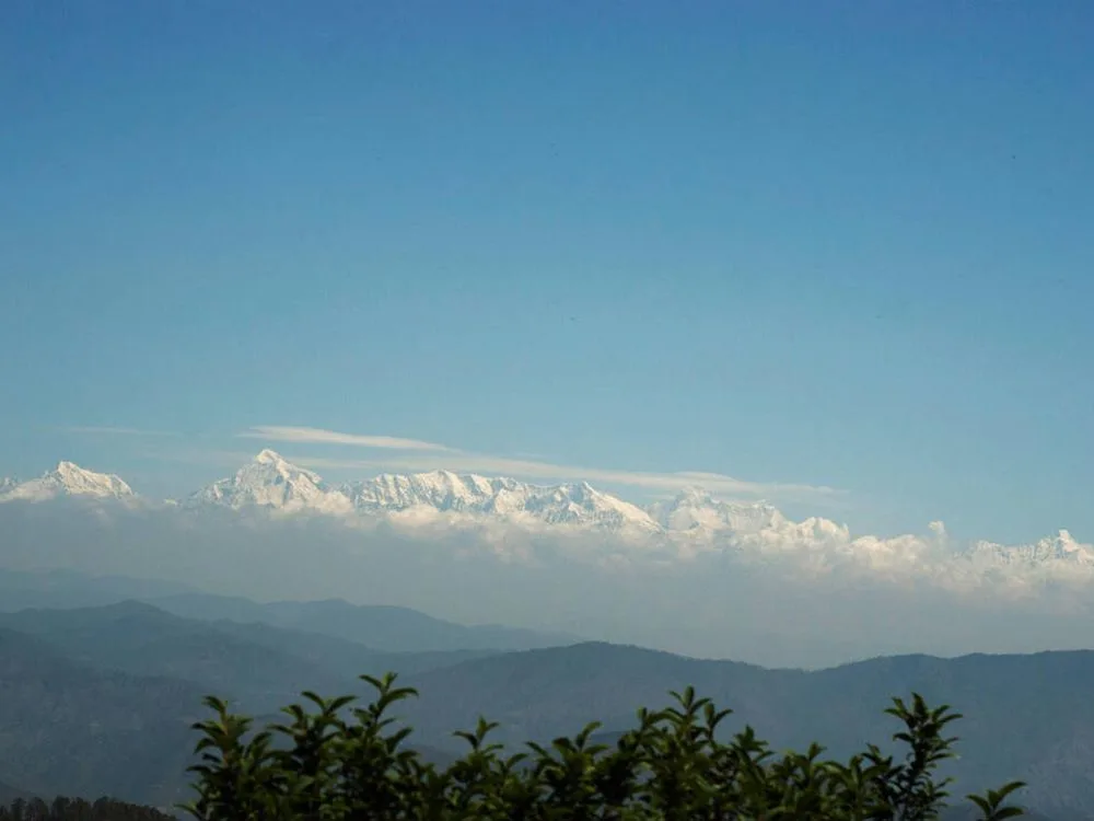 Snow clad peaks visible from Pangot
